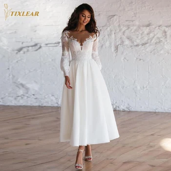 TİXLEAR O-Boyun kısa düğün elbisesi Zarif Uzun Kollu Uzun Aplikler Illusion Düğme gelin kıyafeti Çay Boyu Vestidos De Novia